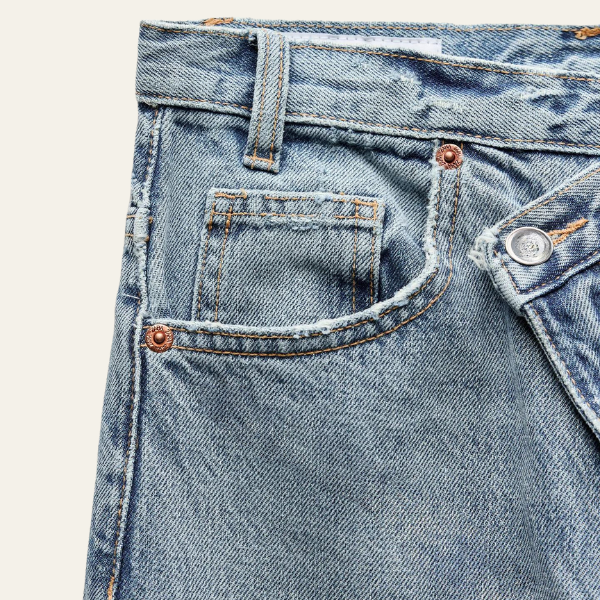 Dunya | Vida jeans med korsad midja