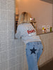 Sarah | Low-rise jeans with embroidered star 